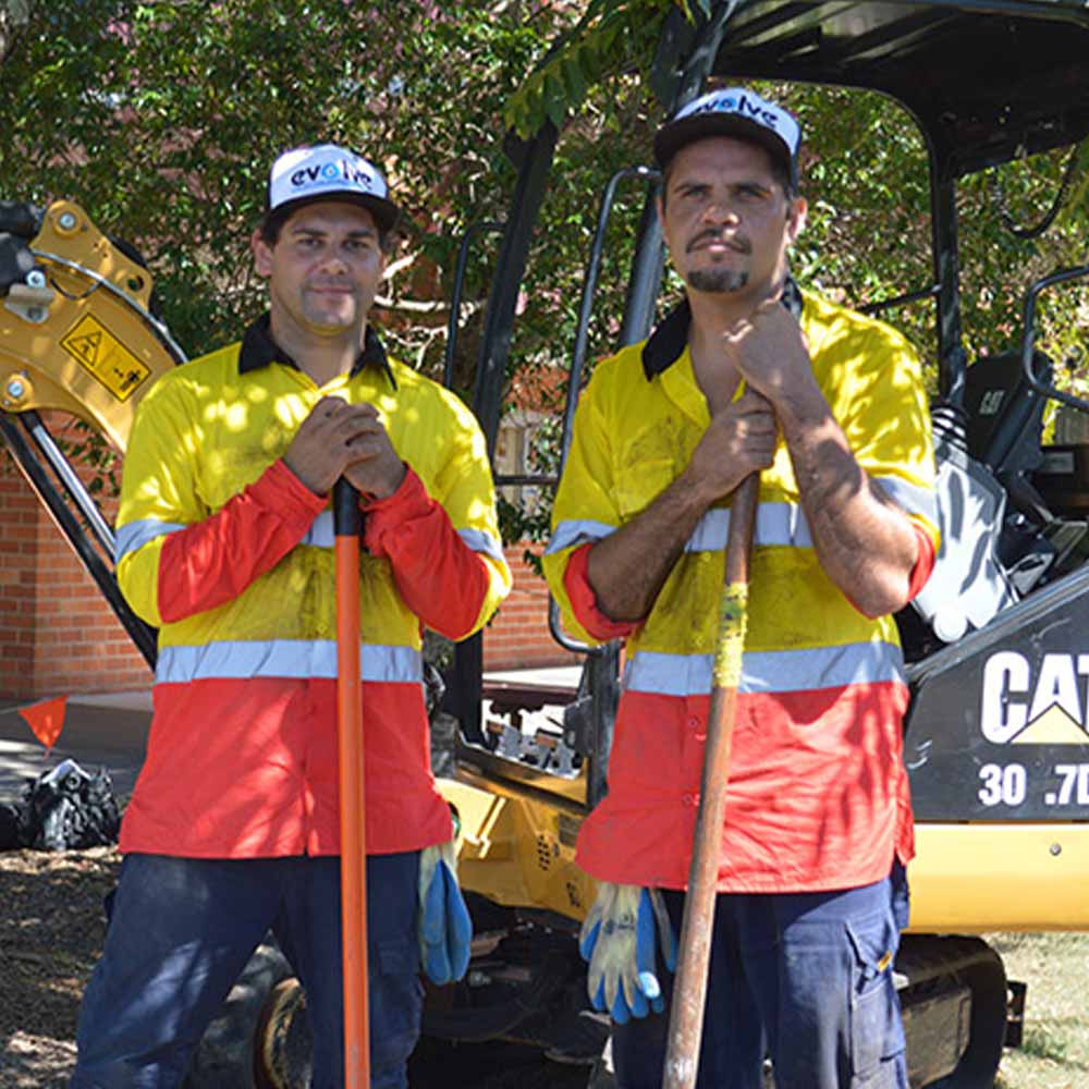 Real Futures - What we do - Construction workers wearing indigenous pride work shirts