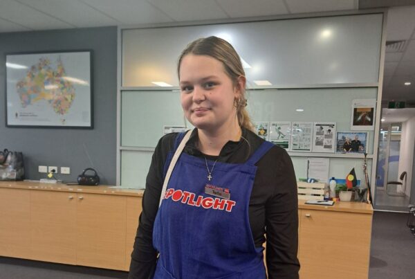 Tarlia working in spotlight store