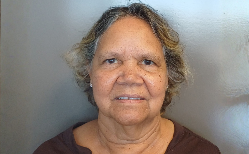 A portrait of Petula, highlighting her journey toward meaningful employment.
